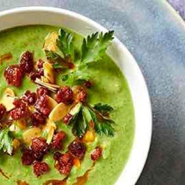 Pea soup with almond and chorizo crumbs